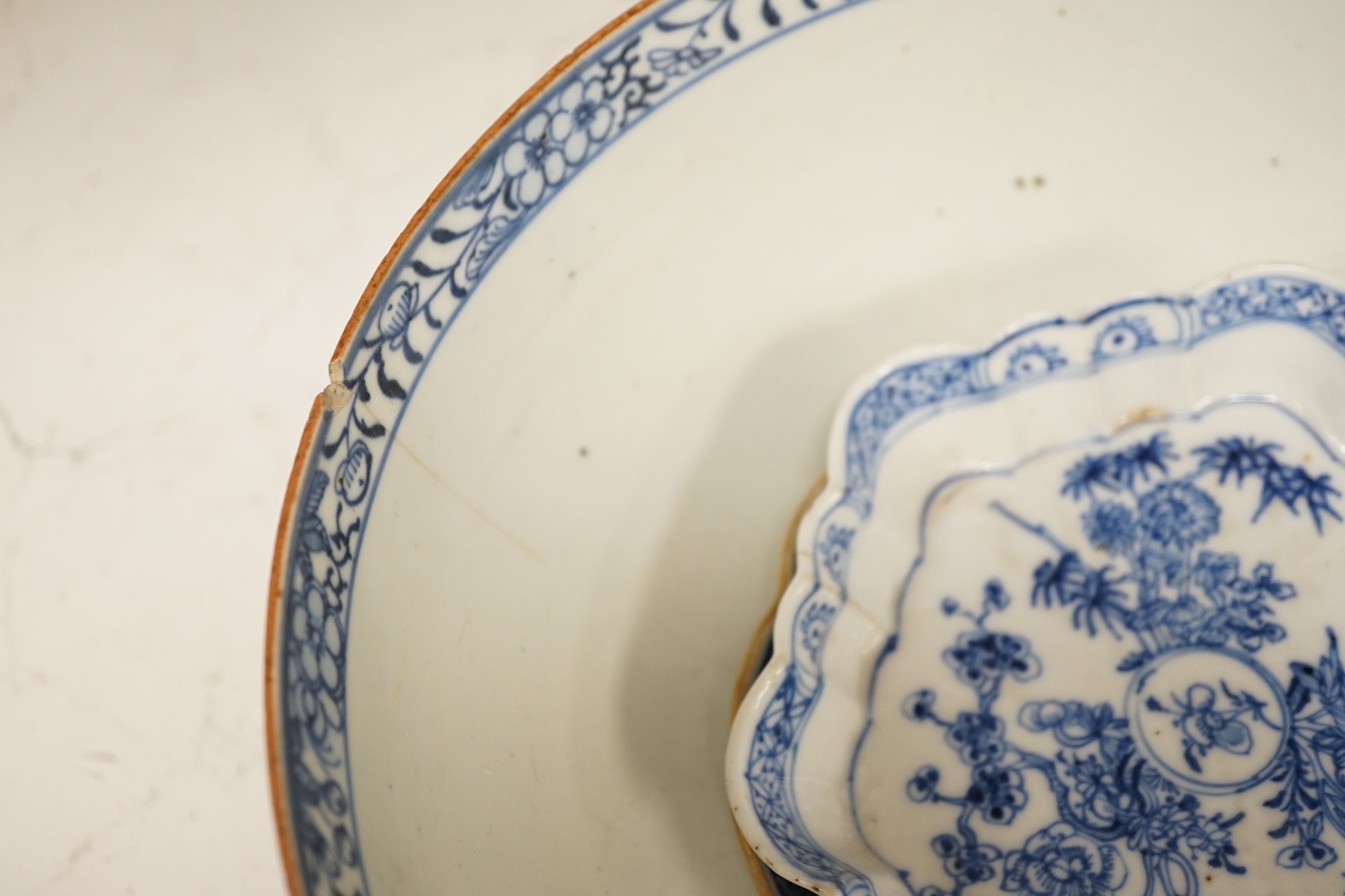 A selection of 18th century blue and white Chinese export bowls and dishes, largest 31cm diameter